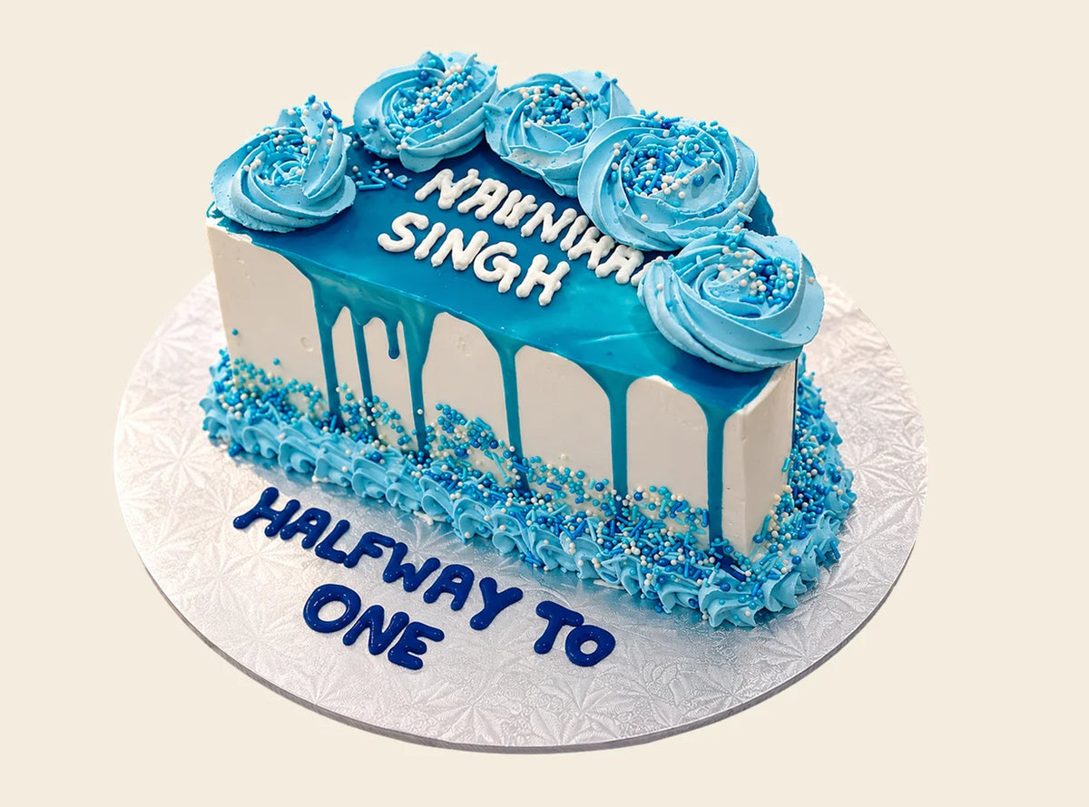 Half Birthday Blue Drip Cake