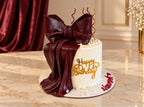 Elegant Bow And Pearl Cake