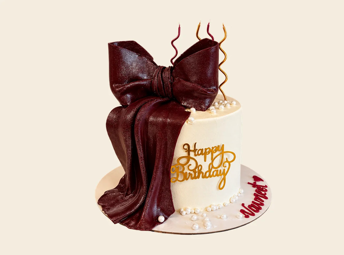 Elegant Bow And Pearl Cake